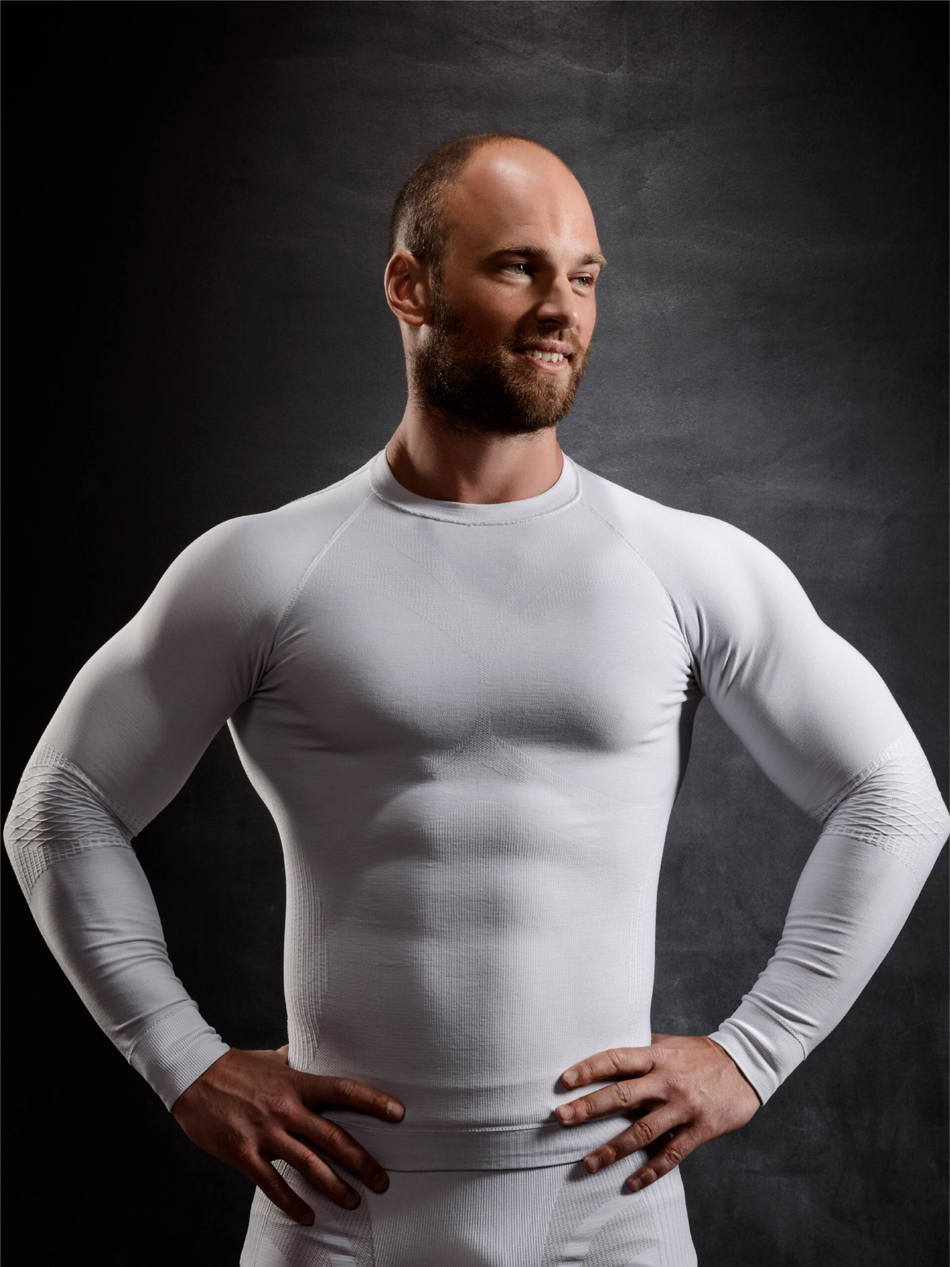 A-man-wearing-a-white-fitness-wear-rash-guard-shirt-scaled.jpg